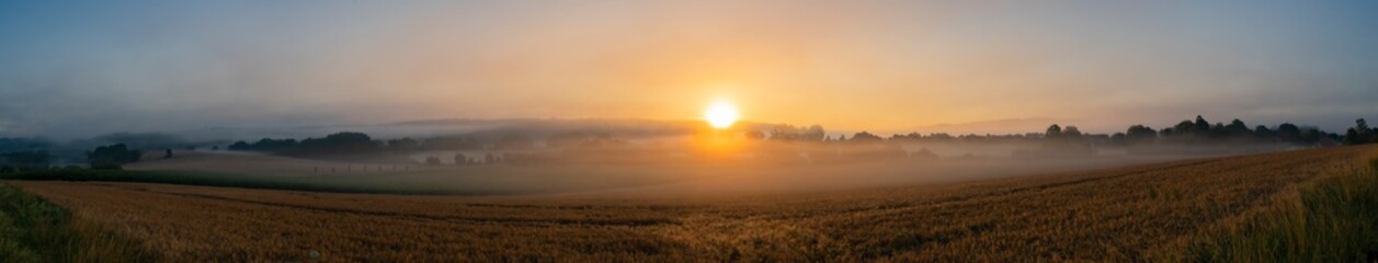 Fototapeta na wymiar Sunrise with fog
