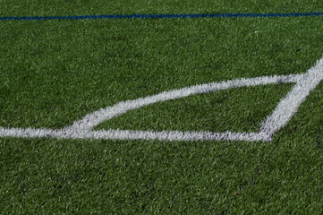 Soccer corner kick lines painted on the AstroTurf.