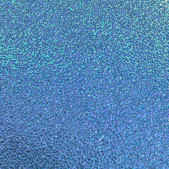 Blue pink green colors foil paper texture background.