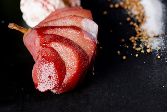 Poached Pear With Vanilla Ice Cream Dessert. Classic American Or French Bakeries Or Pastry Shop Favorites. Cookies, Whipped Cream, Cakes, Chocolate Syrup Butter, Eggs And Vanilla Beans.