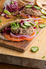 Hamburger made with lamb meat. Lamb burger. Classic traditional greek variation of the classic american burger tradition. seasoned lamb meat with feta cheese, red onion and greek mayo. 