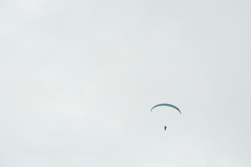 paragliding in the cloudy sky