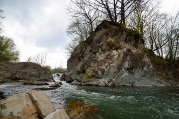 landscape of a noisy mountain river in a rocky gorge
