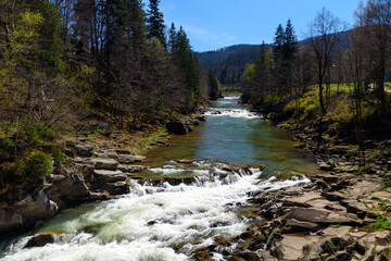 picturesque landscape of a stormy mountain river