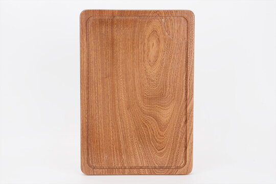 Natural wood cutting caseboard on a white background