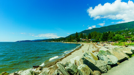 Popular West Vancouver beach looking west on a sunny summer day 