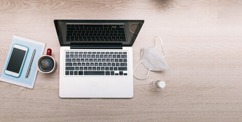 Top view of a workstation with health safety measures