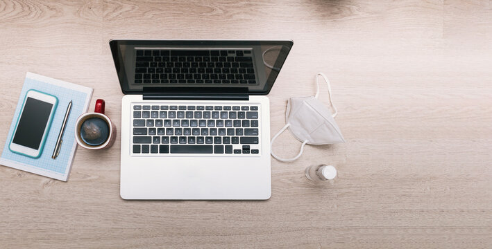 Top view of a workstation with health safety measures