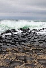 The Giant's Causeway is an area of about 40,000 interlocking basalt columns, the result of an ancient volcanic fissure eruption. It is located in County Antrim on the north coast of Northern Ireland