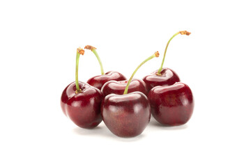 Red cherries on white background.