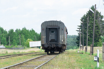 Fototapeta na wymiar The passenger single-section mainline diesel locomotive TEP70-0084 with the Kuvshinovo-Ostashkov suburban train departs from the Rantsevo station in the Tver region. Oktyabrskaya railway.