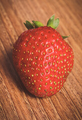 Fresh delicious strawberry on wooden board. Healthy nutrition