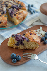 sweet home made almond blueberry pie on a plate