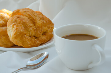 Butter Croissant and Coffee for Breakfast.