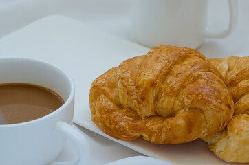 Butter Croissant and Coffee for Breakfast.