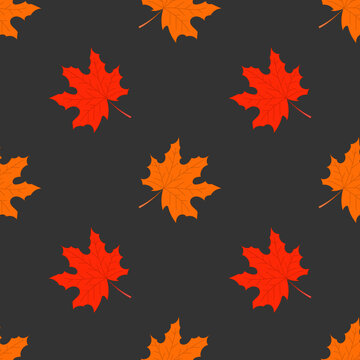 Autumn vector seamless pattern with red and orange maple leaves on a black background.