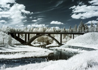 mystical  landscape with a bridge, infrared photography. our beautiful world in the spectrum of...