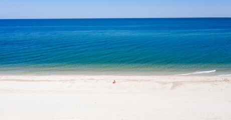 Fototapeta na wymiar sandy beach on the seashore, view from above