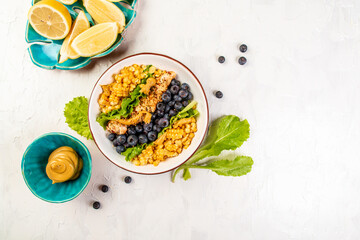 tasty mixed berry salad with corn and chicken fillet, Food recipe background. space for text. top view