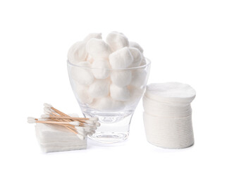 Cotton balls with pads and sticks on white background