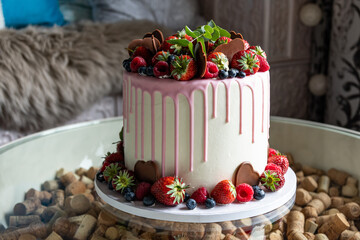 delicious birthday cake with fresh berries