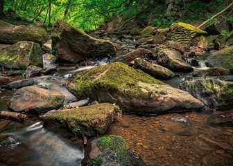Falling Foss waterfall & May Beck, flowing stream through rocks
