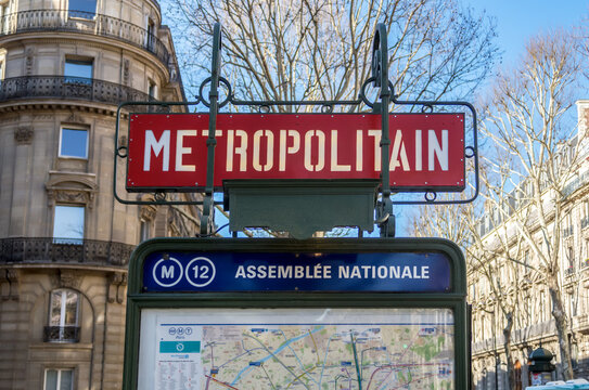 Paris, France - February 25 2019: Metro sign "Metropolitain" at station "Assemblee Nationale" (National Assembly) - Paris, France