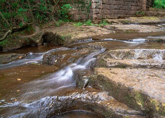 Falling Foss waterfall & May Beck, flowing stream through rocks