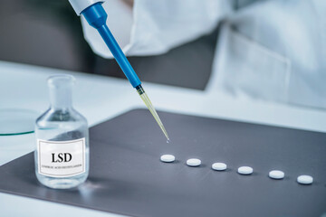 Psychedelic Drug LSD Therapy Research, Scientist Preparing Small Doses of LSD in Laboratory