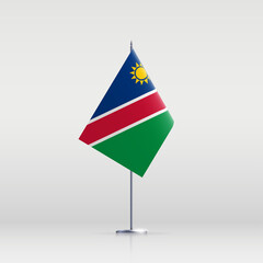 Namibia flag state symbol isolated on background national banner. Greeting card National Independence Day of the Republic of Namibia. Illustration banner with realistic state flag.