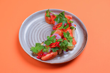 Vegetable salad with juicy tomatoes, lettuce, green olives, cucumber, red onion and fresh parsley.