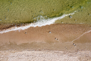 sandy beach on the seashore, view from above