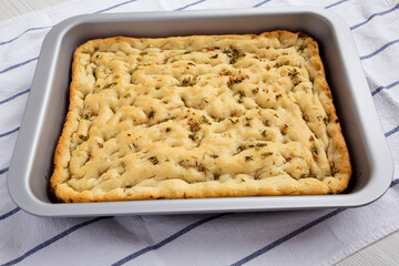 Home-baked Rosemary Garlic Focaccia Bread, side view.