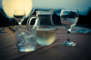 carafe of wine on blue background