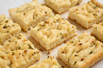 Home-baked Rosemary Garlic Focaccia Bread, side view.
