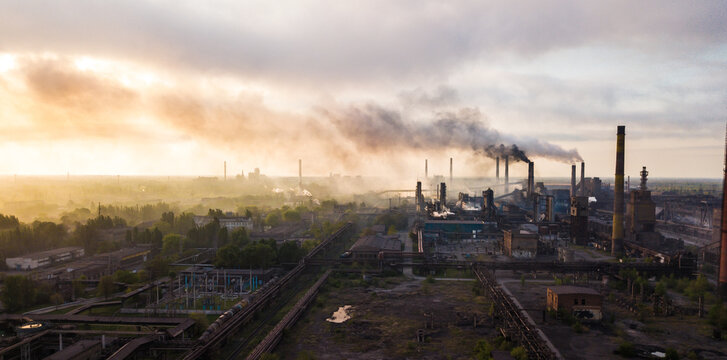 industry metallurgical plant dawn smoke smog emissions bad ecology aerial photography