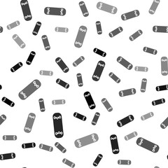 Black Skateboard trick icon isolated seamless pattern on white background. Extreme sport. Sport equipment. Vector Illustration.