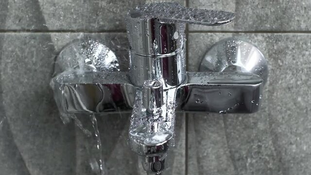 Plumber fixing repairing a leaky shower Bathtub water tap  faucet by wrench tool,  plumbing fix  mount DIY concept