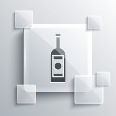 Grey Glass bottle of vodka icon isolated on grey background. Square glass panels. Vector Illustration.