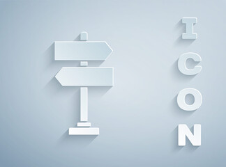 Paper cut Road traffic sign. Signpost icon isolated on grey background. Pointer symbol. Isolated street information sign. Direction sign. Paper art style. Vector Illustration.