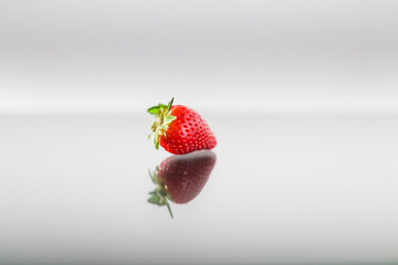 Red strawberry on white the white background