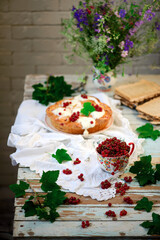 sweet red currant buns with Cream Cheese Frosting..selective focus