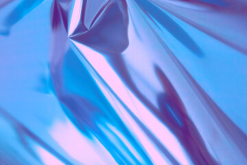 Bright multicolor holographic foil background. Trendy backdrop