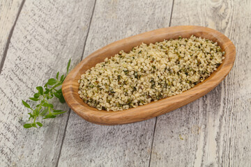 Peeled hemp seeds in the bowl
