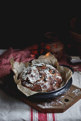 bread with cranberries and nuts on the table