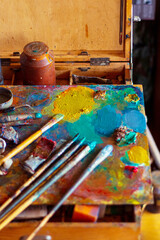 Colorful artist's palette with oil paints