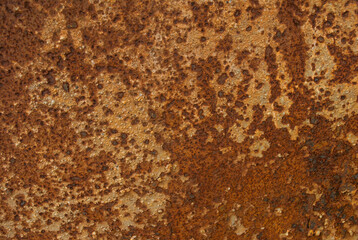 Rusted texture. Rust. The old weathered metal panel. Expanded and exfoliated paint. Mesh structure of the painted surface.