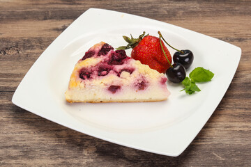 Cheesecake with cherry served strawberry