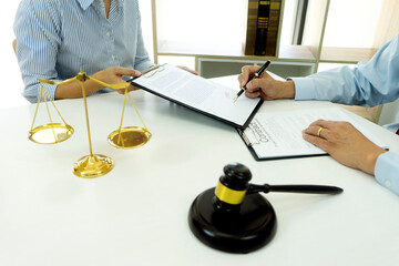 On the table in the lawyer office businessman signature