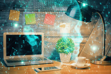 Double exposure of desktop computer and human brain drawing hologram. Ai concept.